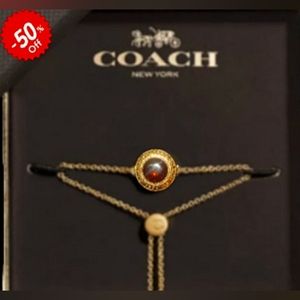 Gorgeous Fashionable Coach Gold Medallion